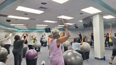 South Holland Library Patrons enjoying the Cardio Drumming Class 