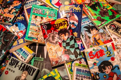 Haphazard pile of manga book covers