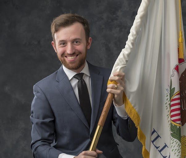 Presenter John Kokoris with Illinois flag