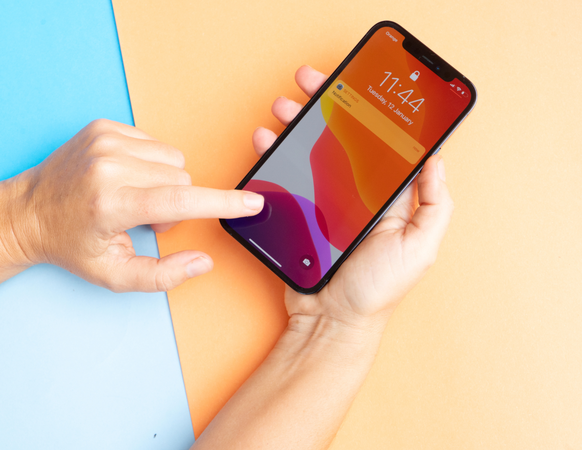 Picture of someone using an iPhone 15